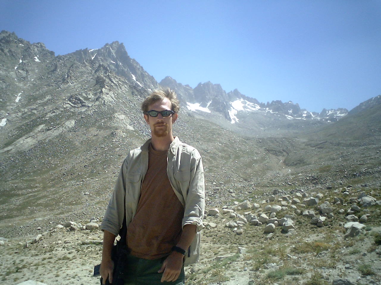 Richard Brion stands in front of the Salang Pass Mountains.